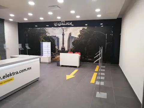 Módulo Italika con mural fotográfico y mostrador Elektra