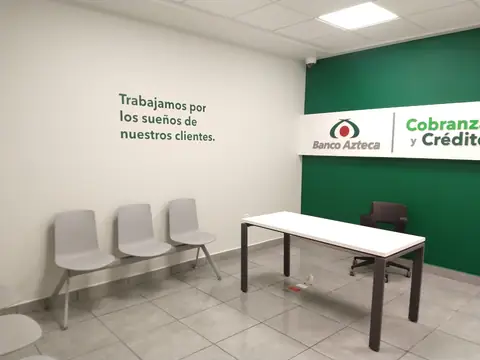 Sala con muro verde «Cobranza y Crédito»